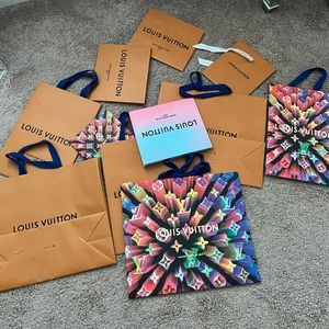 10 Louis Vuitton shopping bags.